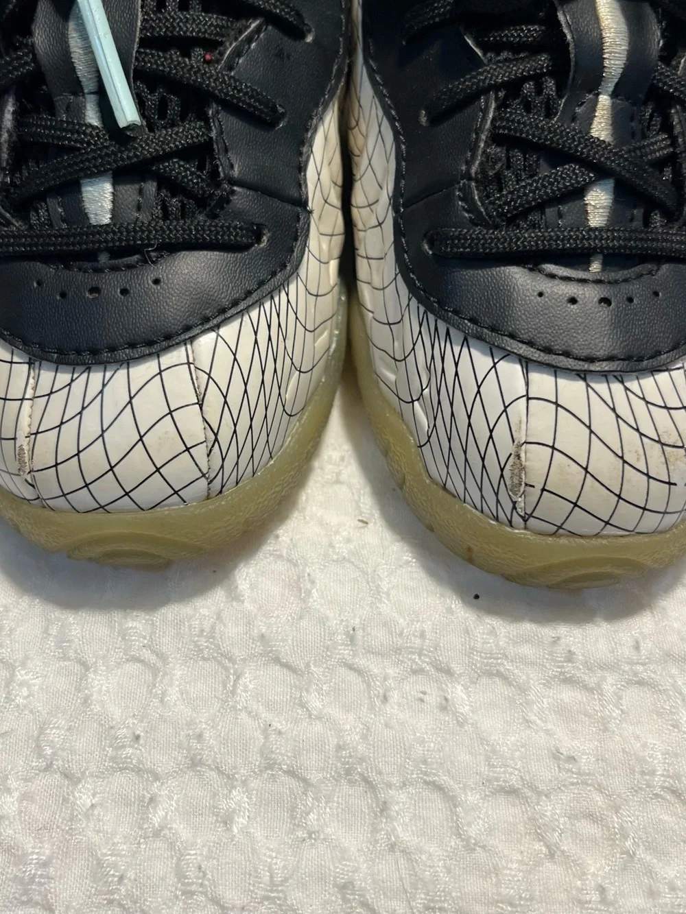 Nike Baby Black and White Grid Wrapped Sneakers with Teal Accents